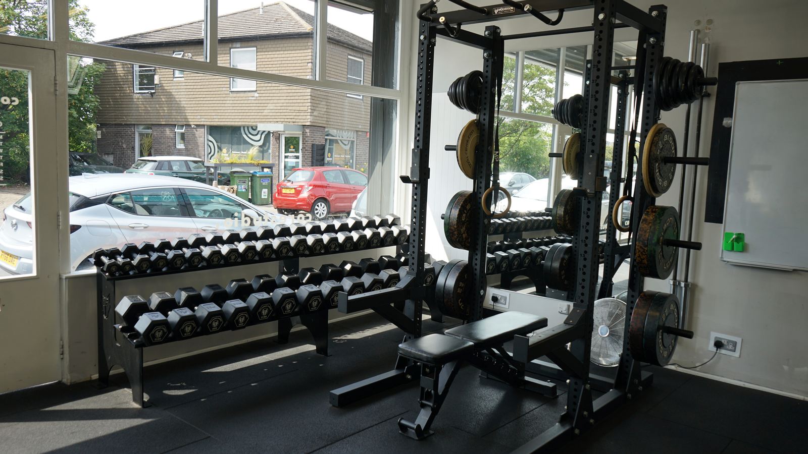 The weights floor at Core Studio in Blackheath, with dumbbell rack, squat rack and free weights